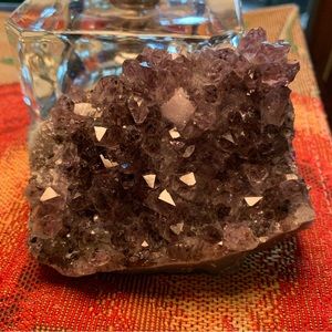 Amethyst crystal with  one milky quartz hexagon crystal of quartz in matrix